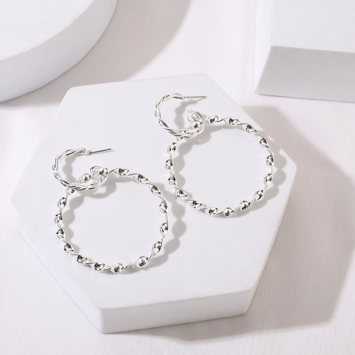 Diamond Cut Circles Earrings